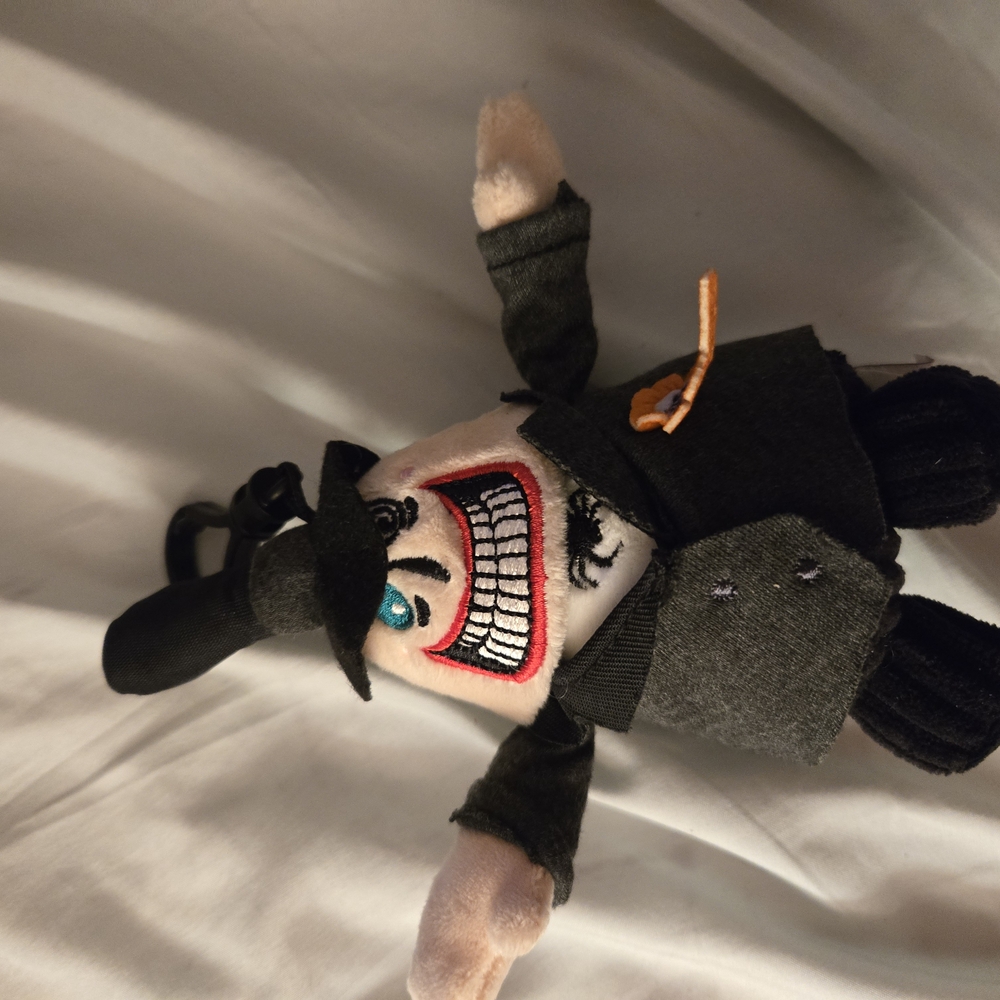 Plush Toy with Black and Gray Outfit